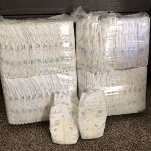 Huggies Diapers/few misc diapers